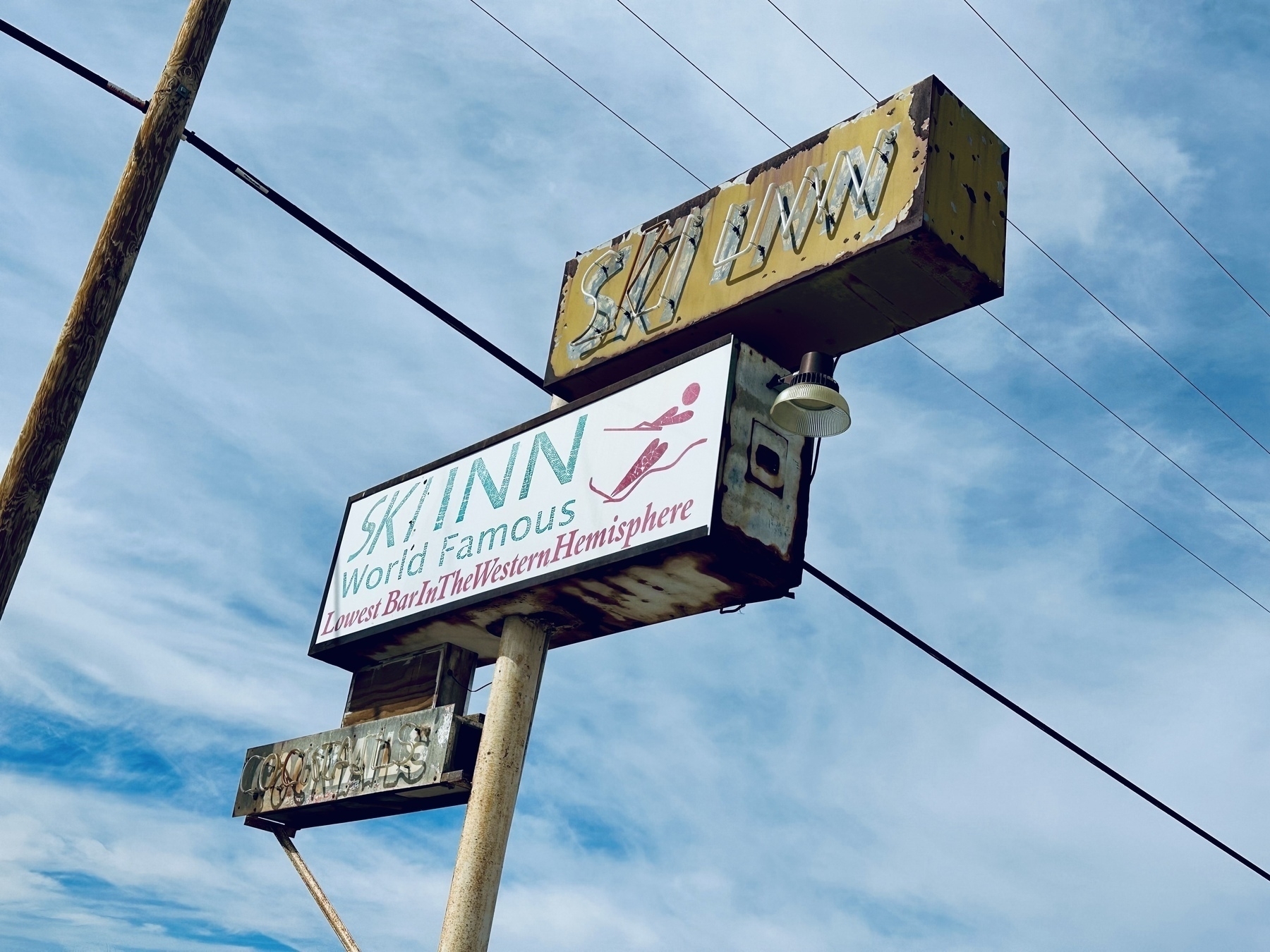 The Ski Inn roadside sign, which is the lowest elevation bar in the western hemisphere, sitting nearly 200 feet below sea level.