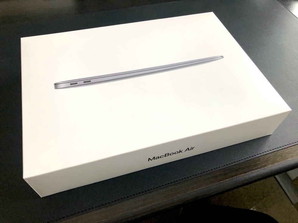 A MacBook Air box on a desk.