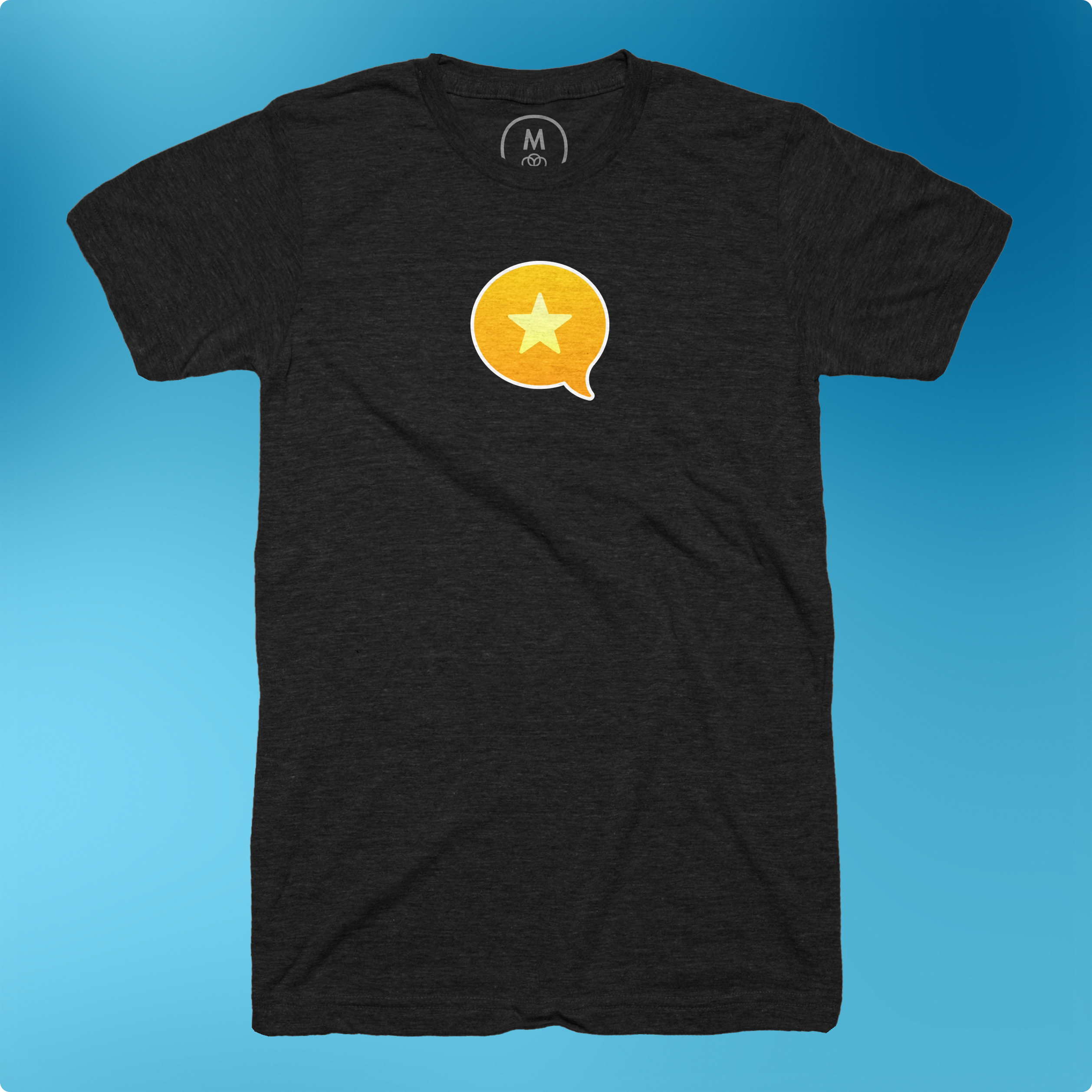 Auto-generated description: A black t-shirt that features the Micro.blog logo, which is a yellow speech bubble with a white star inside. The t-shirt appears on a blue gradient background.